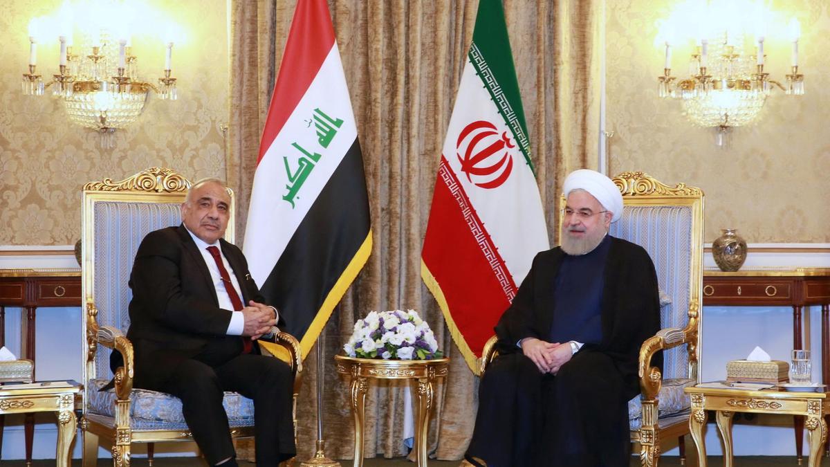 رئيس وزراء العراق المستقيل مع حسن روحاني الرئيس الايراني