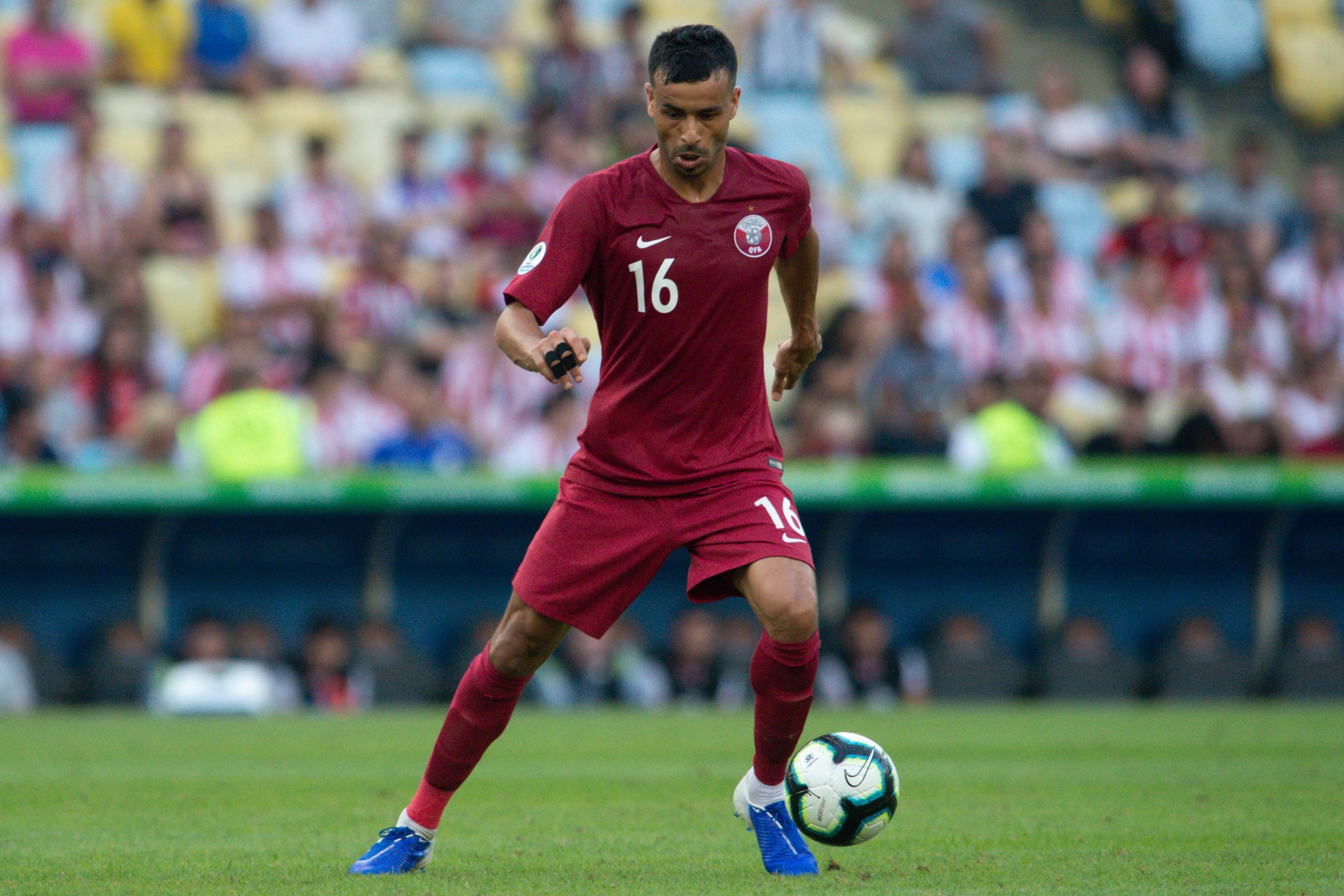 Shutter Stock/ لماذا يطلق على منتخب قطر لقب العنابي؟